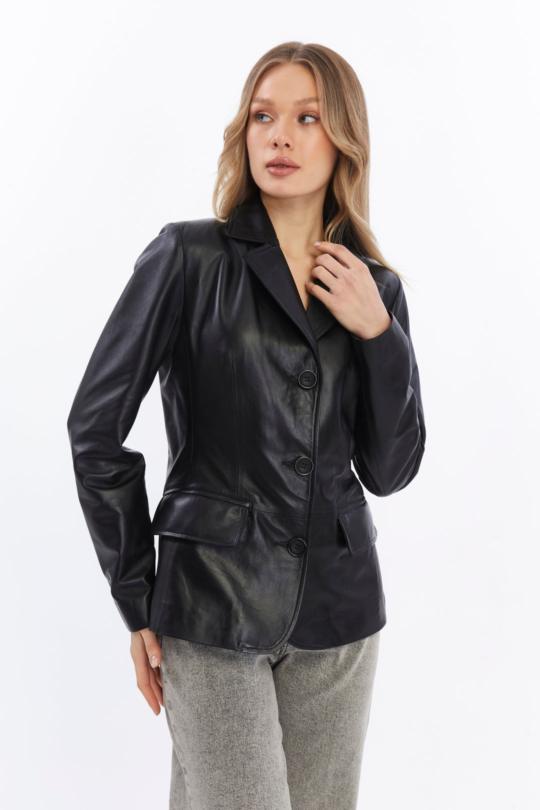Woman wearing black leather blazer jacket