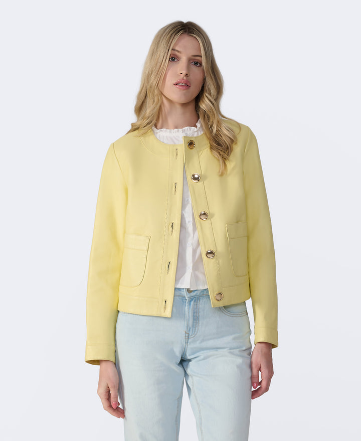 Female model wearing pale yellow jacket