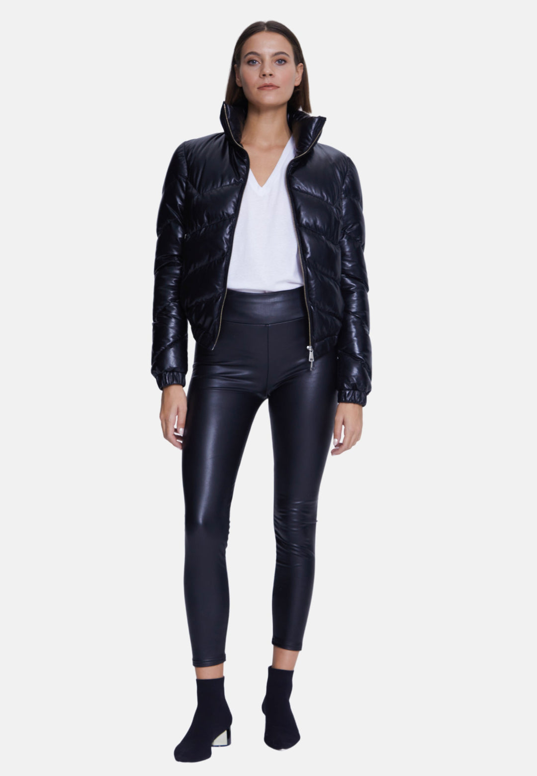 Woman wearing black padded leather jacket