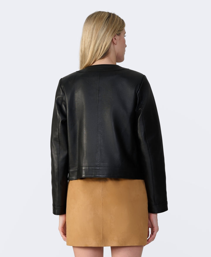 Black leather jacket back view on model