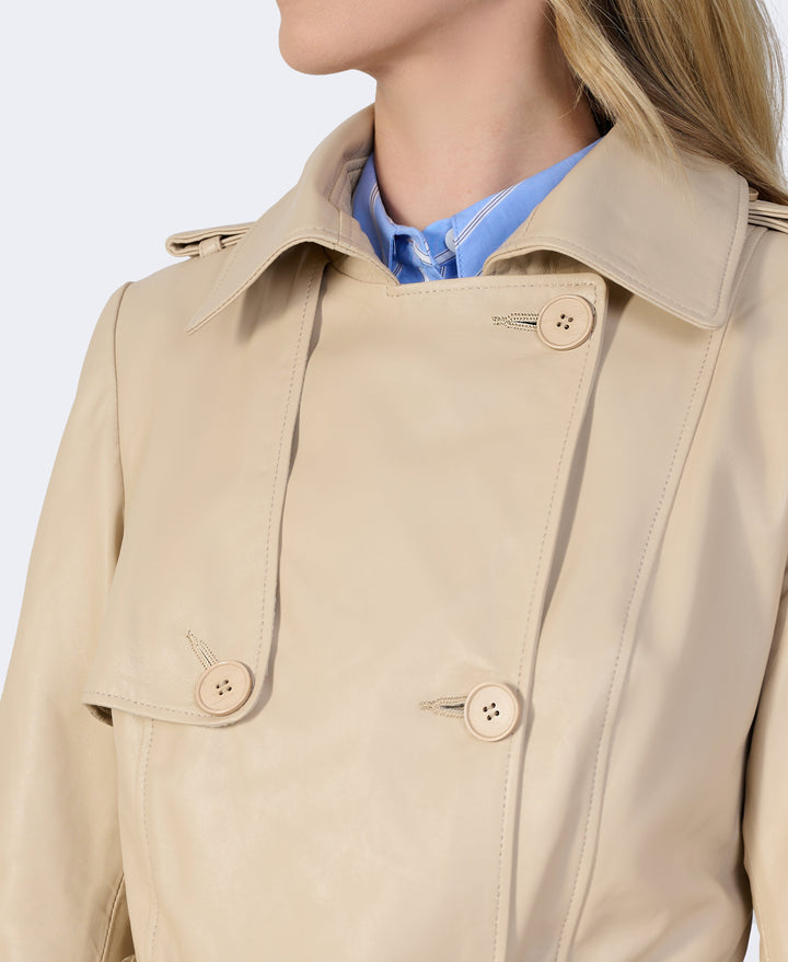 Beige leather trench coat close-up