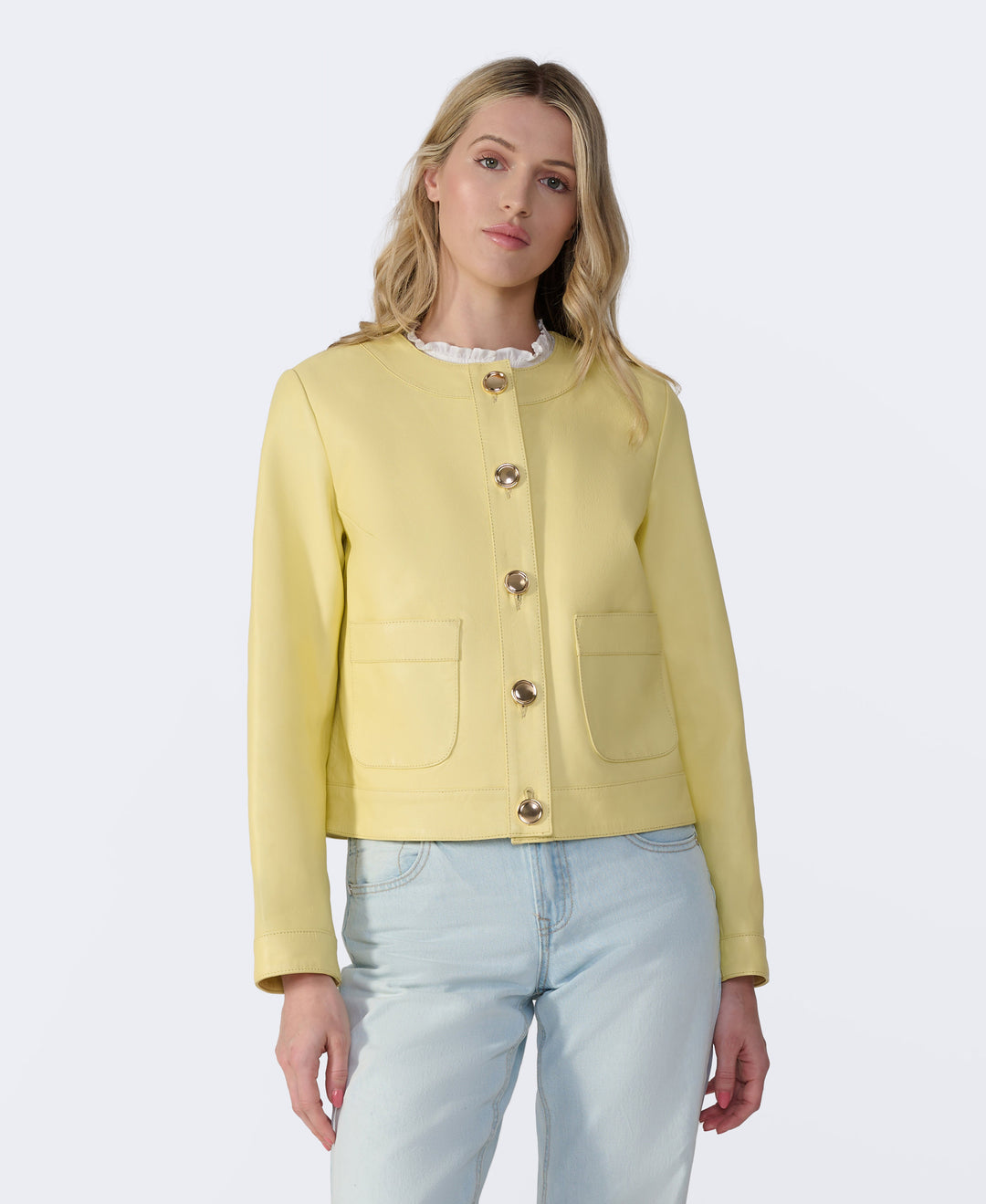 Pastel yellow leather jacket on model