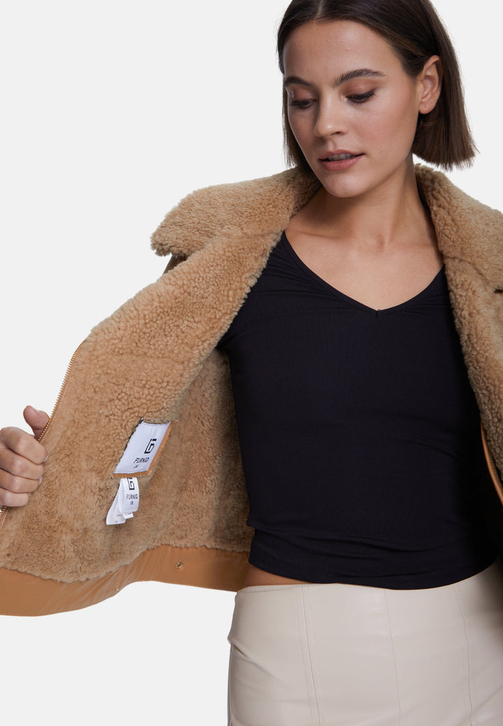 Beige shearling jacket on model