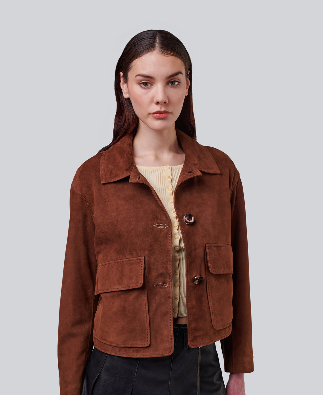 Brown suede jacket on model