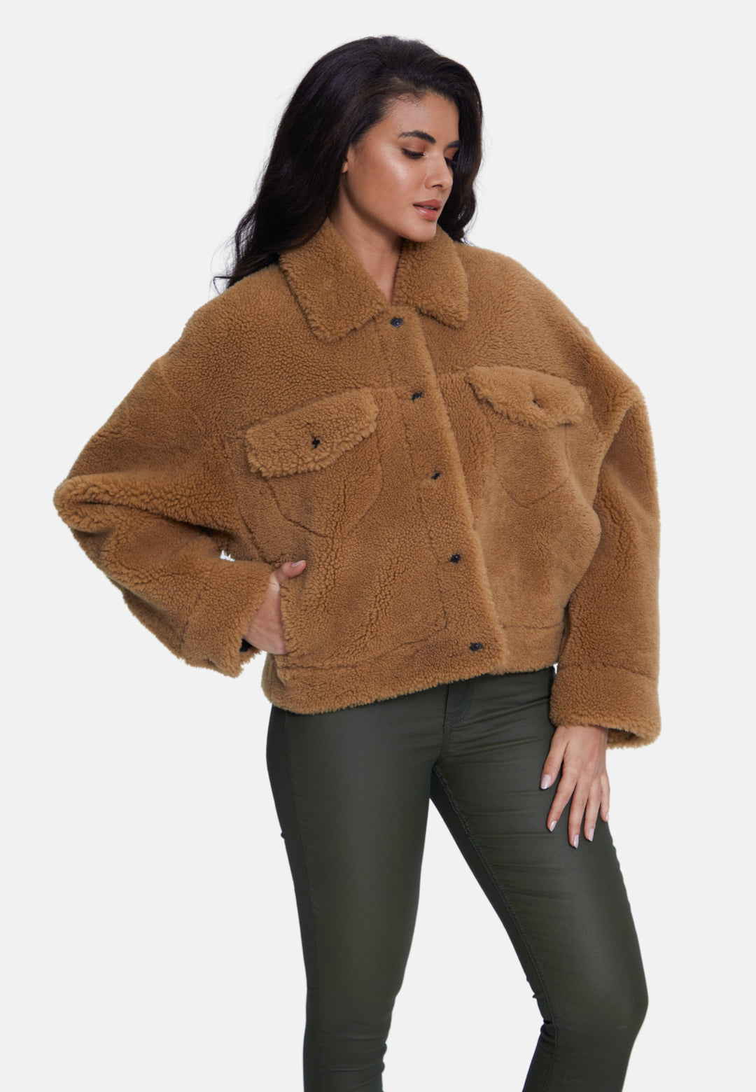 Female model in brown teddy jacket