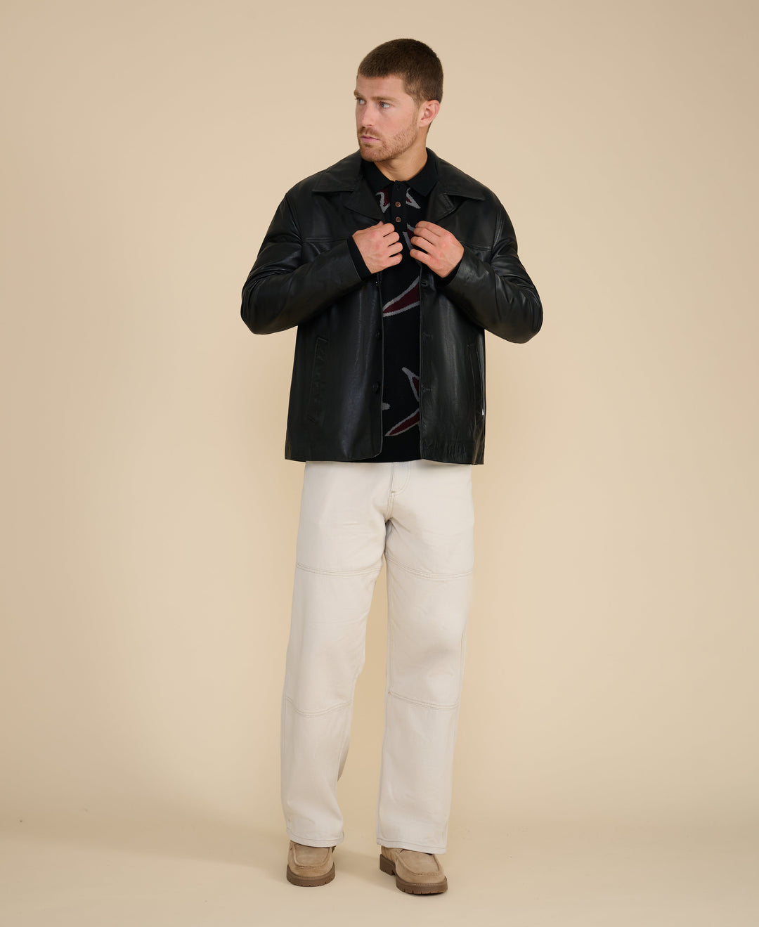 Male model wearing black relaxed blazer