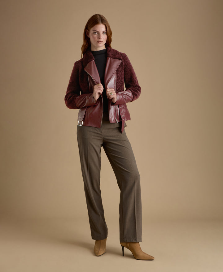 Portrait detail of Alice burgundy leather and shearling jacket crafted from British leather