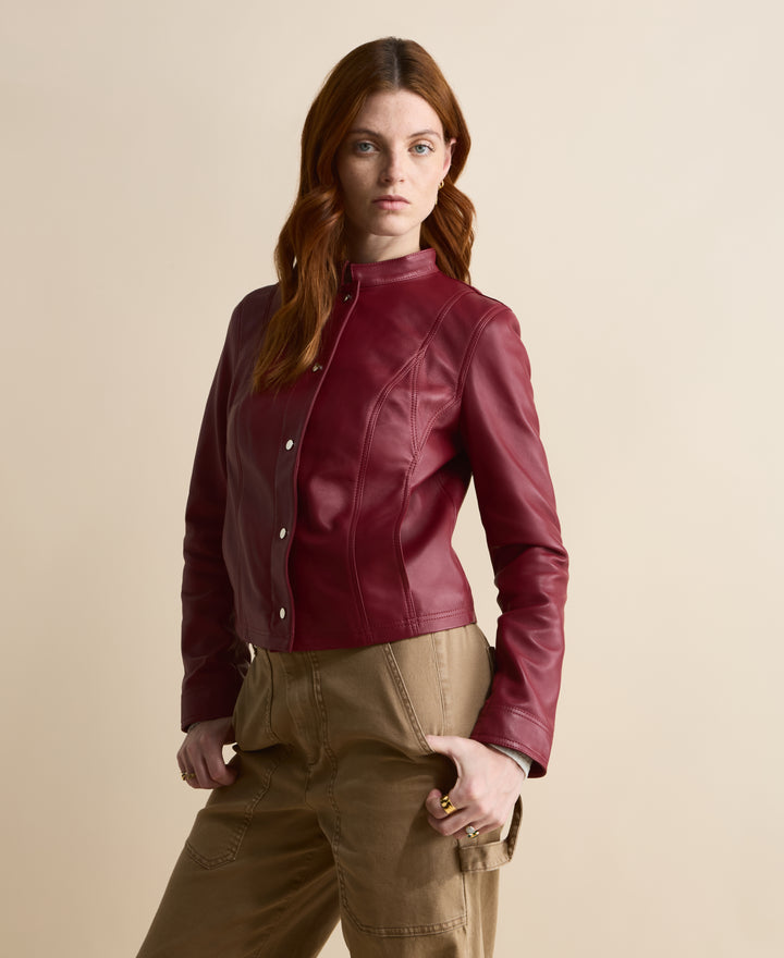 Front view of Amelia women's burgundy leather jacket with snap-button fastening