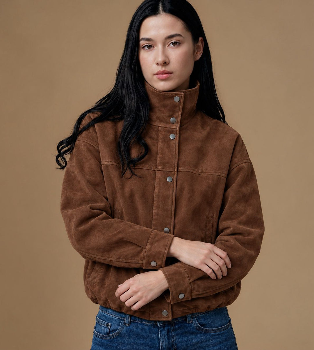 Front view of the Arden brown suede jacket with the funnel collar fastened and snap cuffs visible