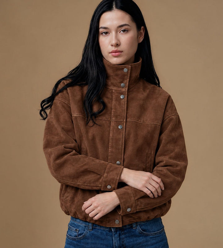 Front view of the Arden brown suede jacket with the funnel collar fastened and snap cuffs visible