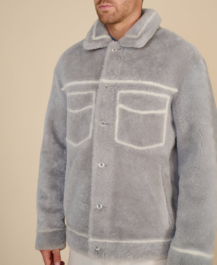 Ashton men's grey shearling jacket detail showing contrast shearling trim