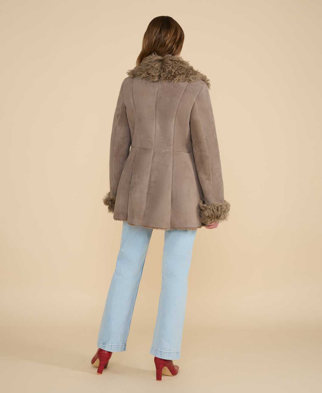 Back view of Aubrey taupe shearling coat