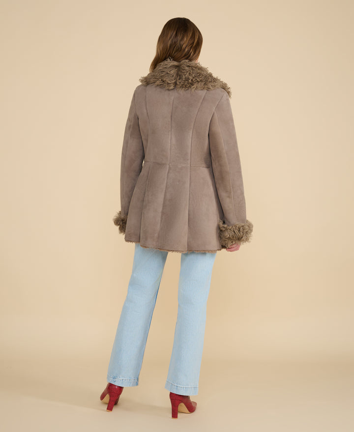 Back view of Aubrey taupe shearling coat
