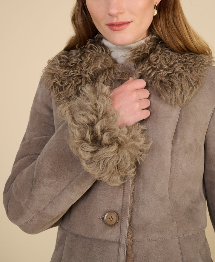Curly shearling collar detail on Aubrey taupe coat