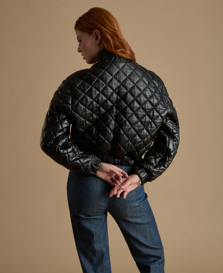 Rear view of Aveline black quilted leather jacket