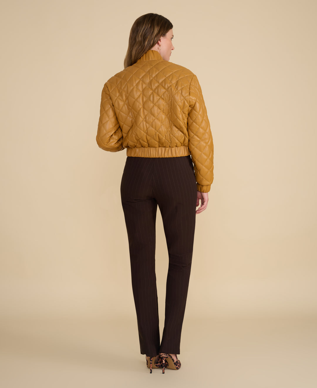 Rear view of Aveline caramel quilted leather jacket
