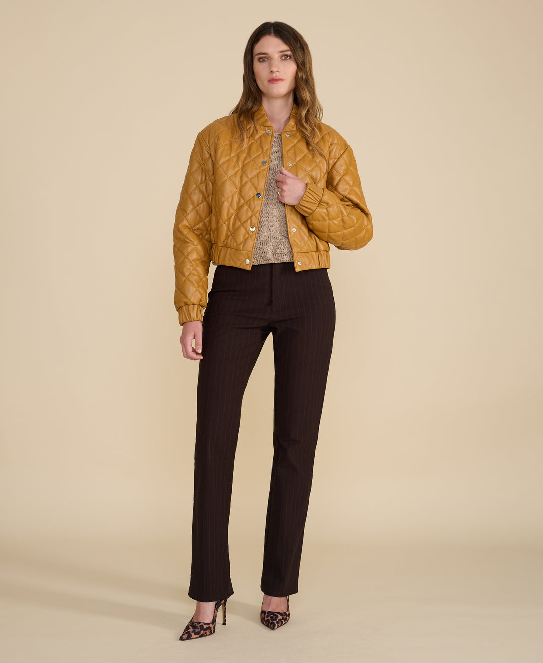 Full-length view of Aveline caramel quilted leather jacket