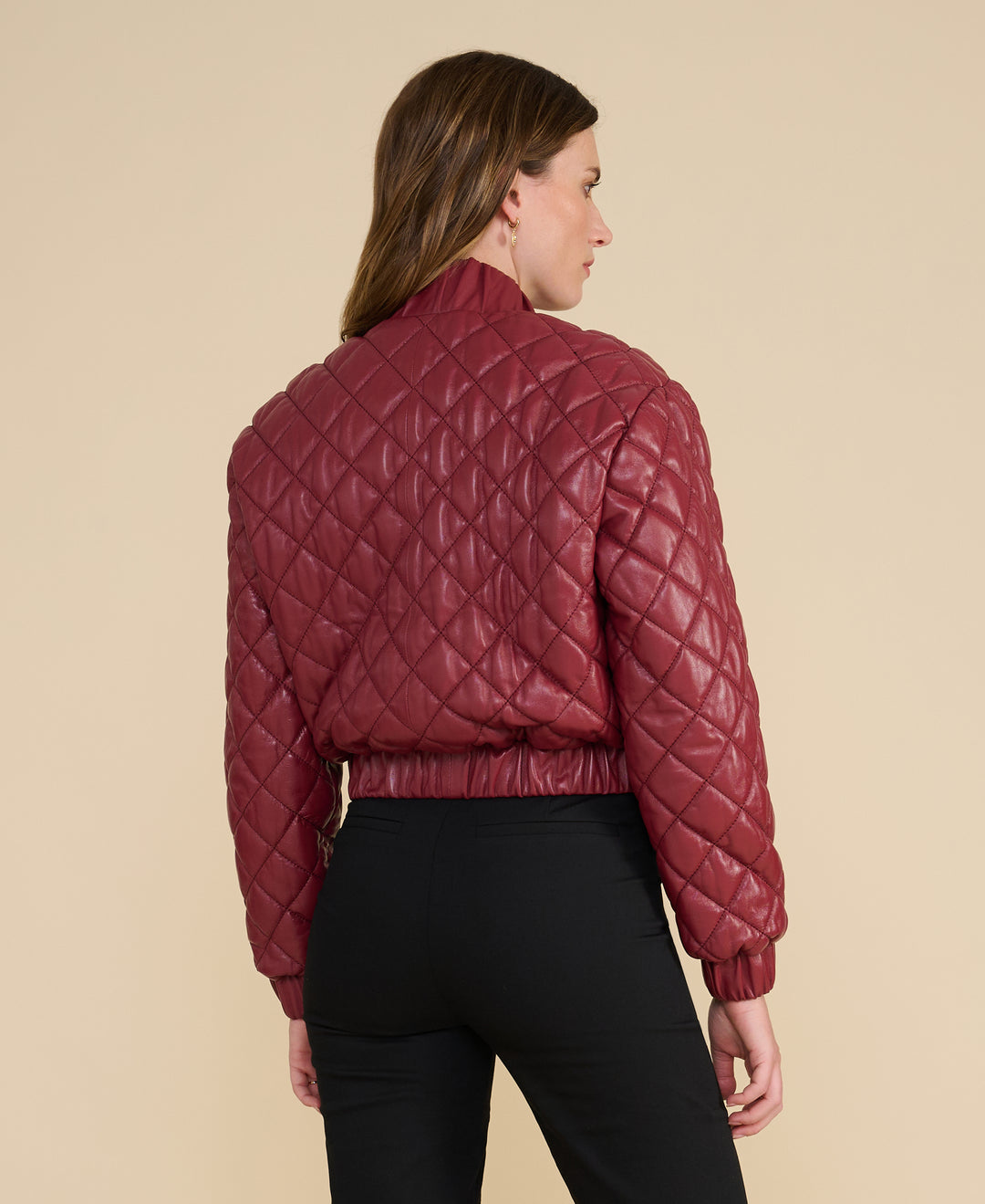 Back view of Aveline light burgundy quilted leather jacket