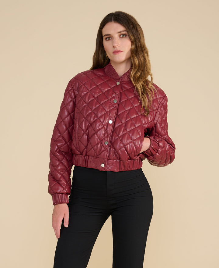 Full length view of Aveline light burgundy quilted leather jacket