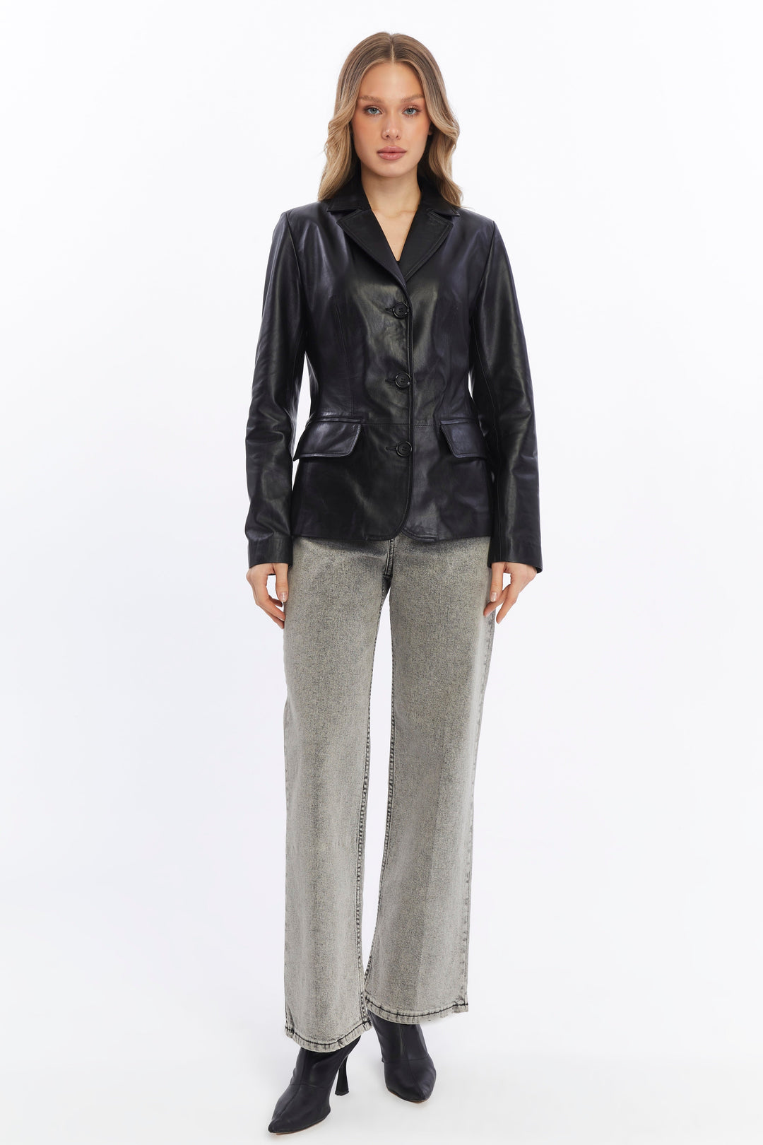 Woman wearing black leather blazer