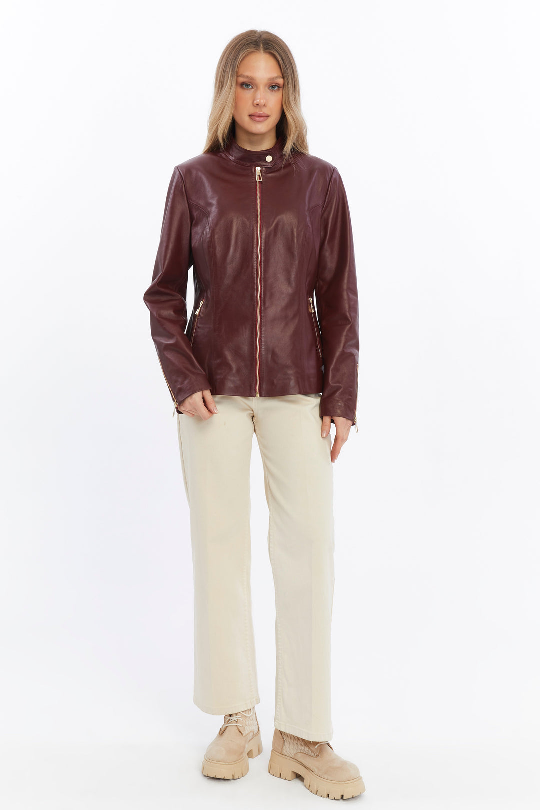 Woman wearing burgundy leather jacket