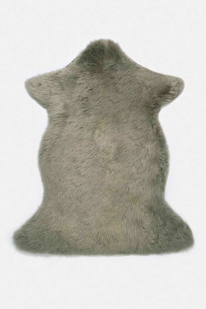 Light green sheepskin rug