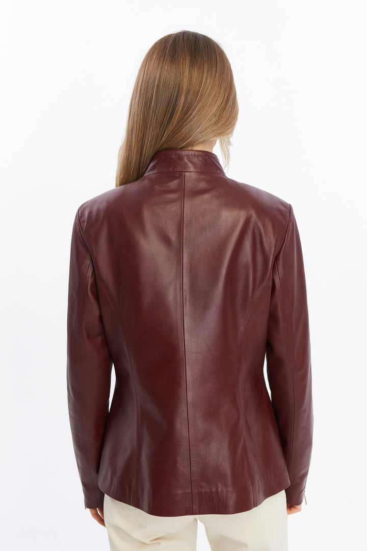 Back view burgundy leather jacket on model