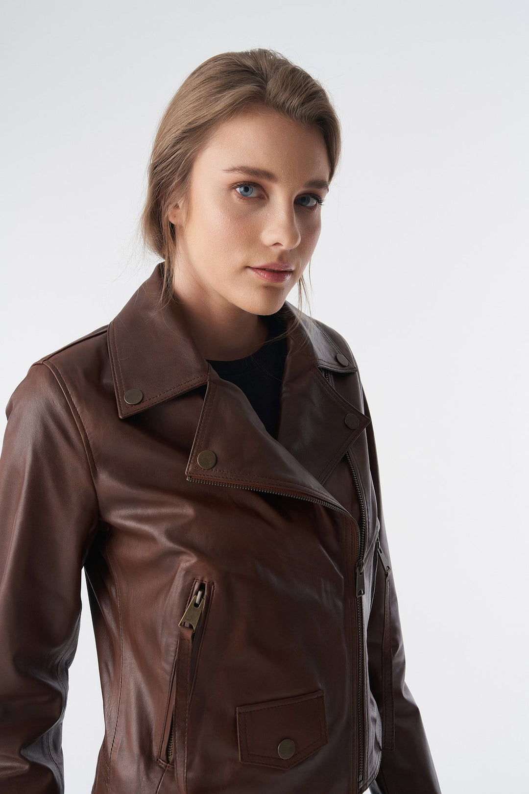 Woman wearing brown leather jacket