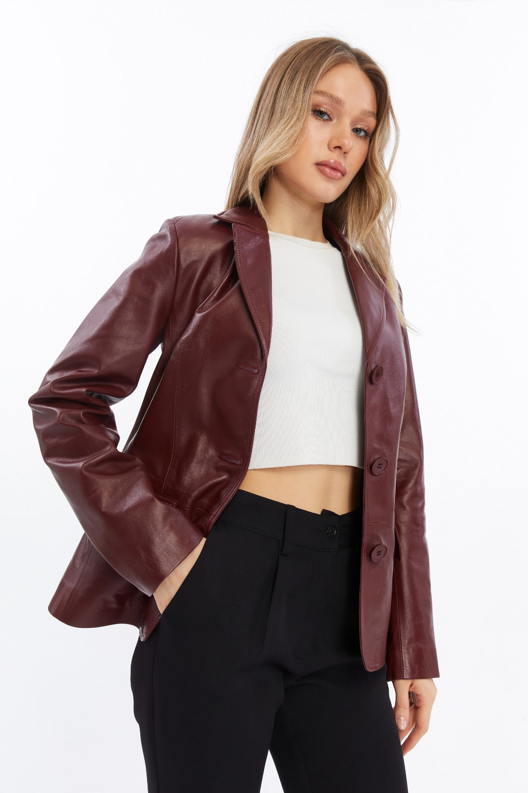 Woman wearing burgundy leather blazer