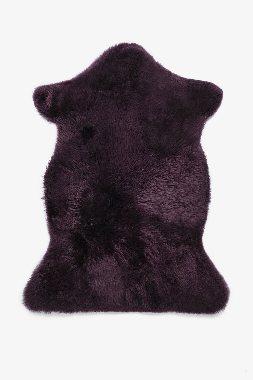 Single purple sheepskin rug