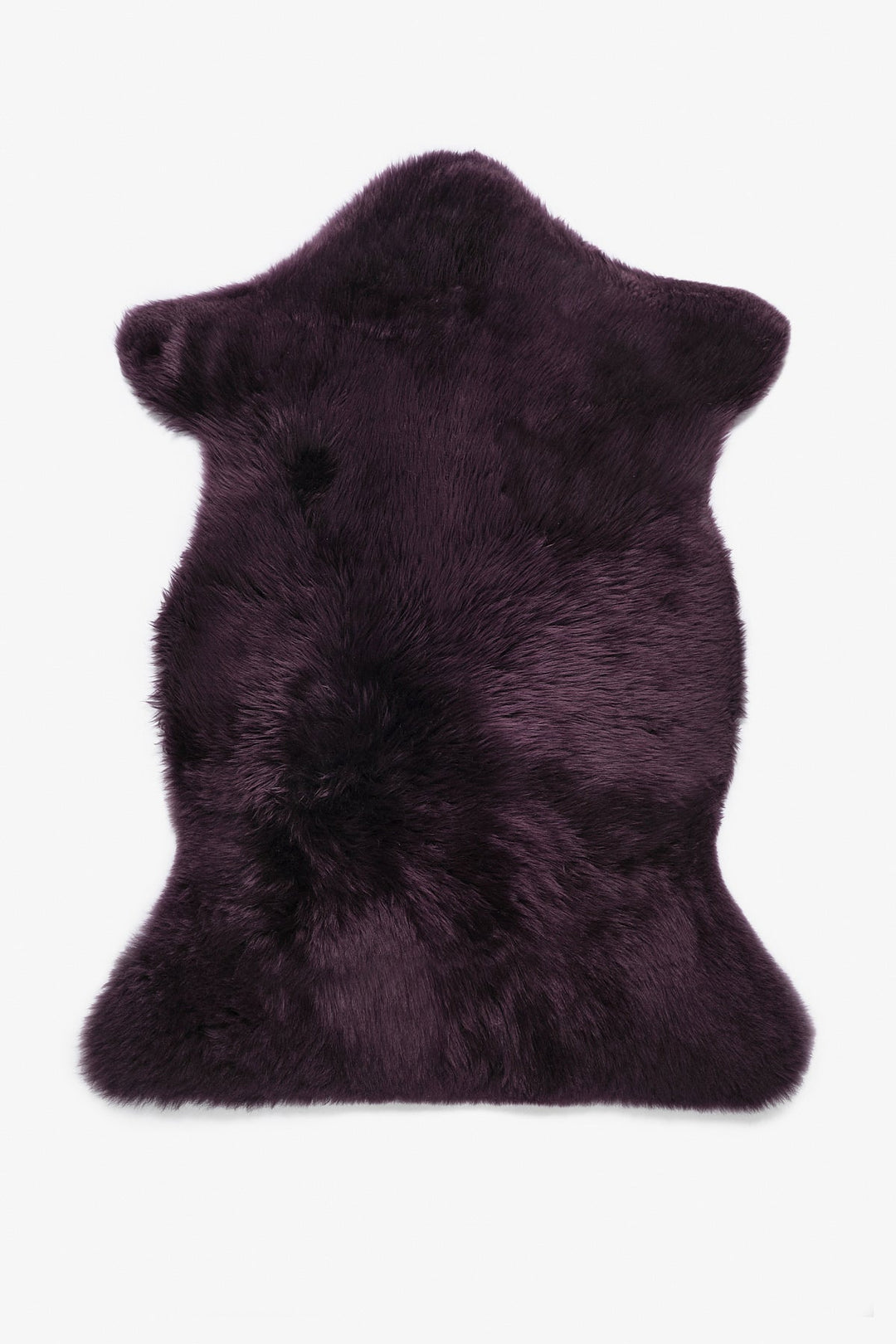 Single purple sheepskin rug