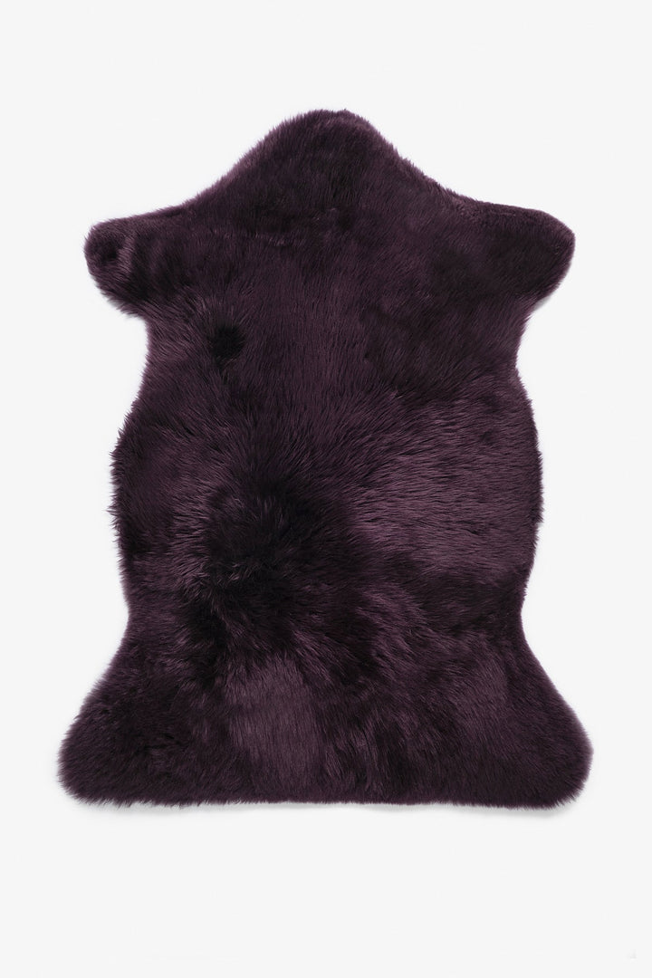 Single purple sheepskin rug