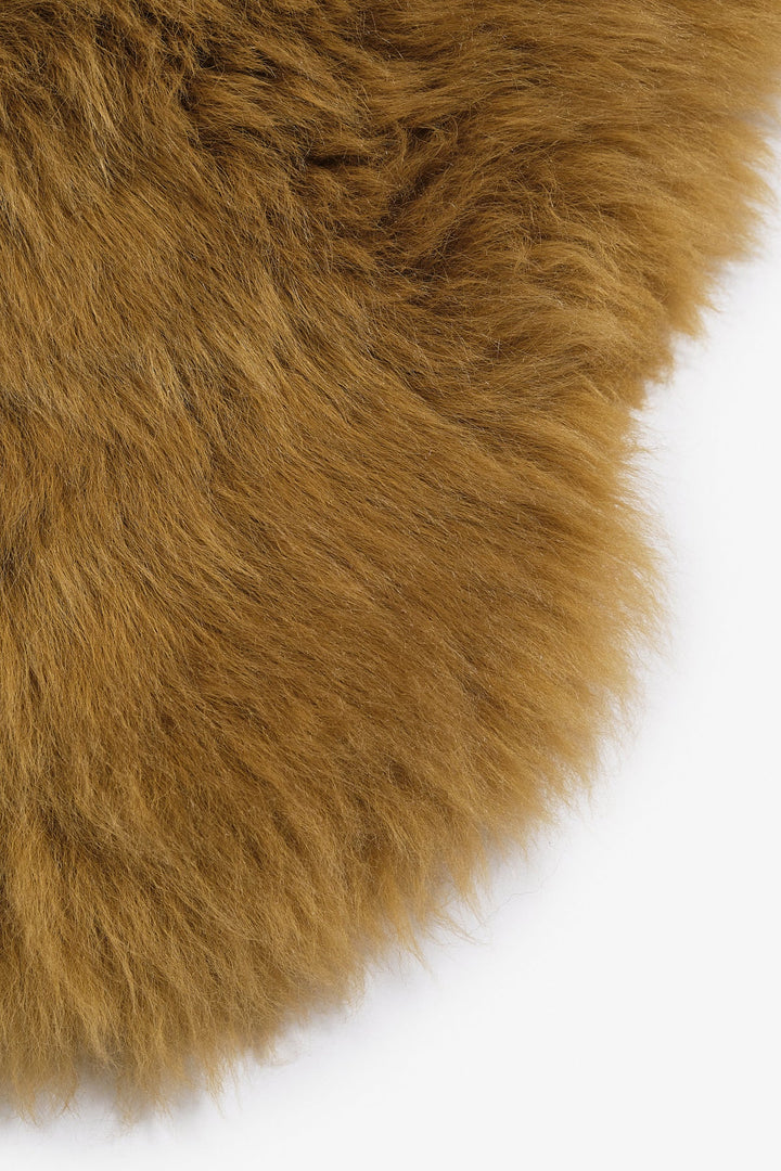 Mustard sheepskin rug close-up