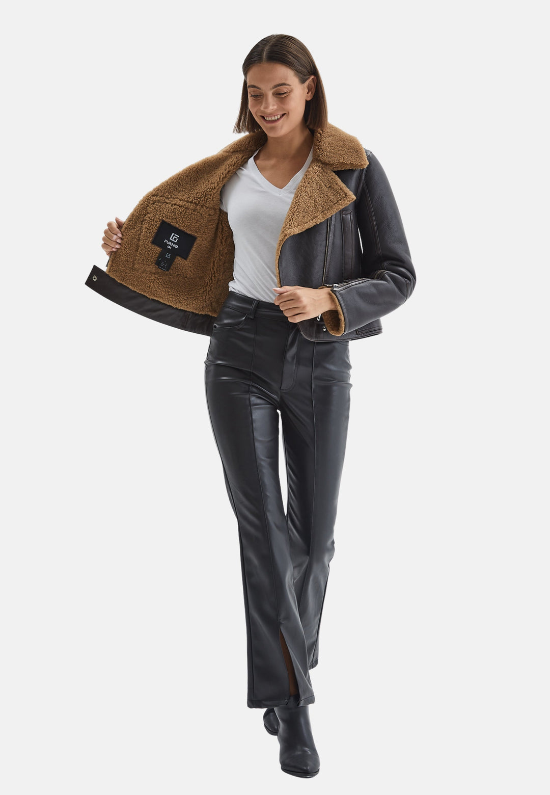 Woman wearing brown-lined sheepskin jacket