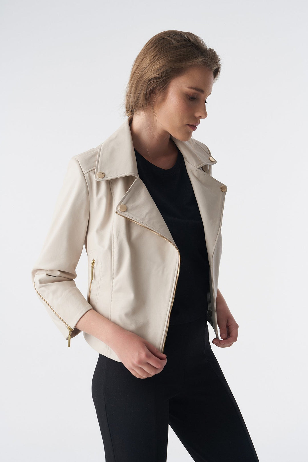 Beige leather biker jacket on model