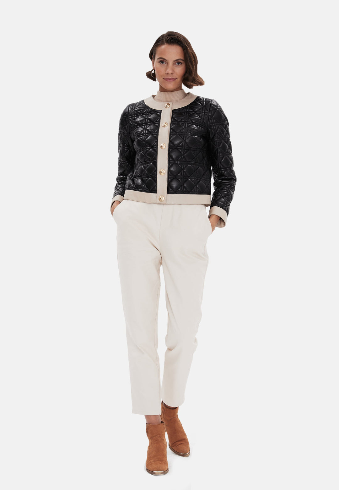 Woman wearing black quilted leather jacket