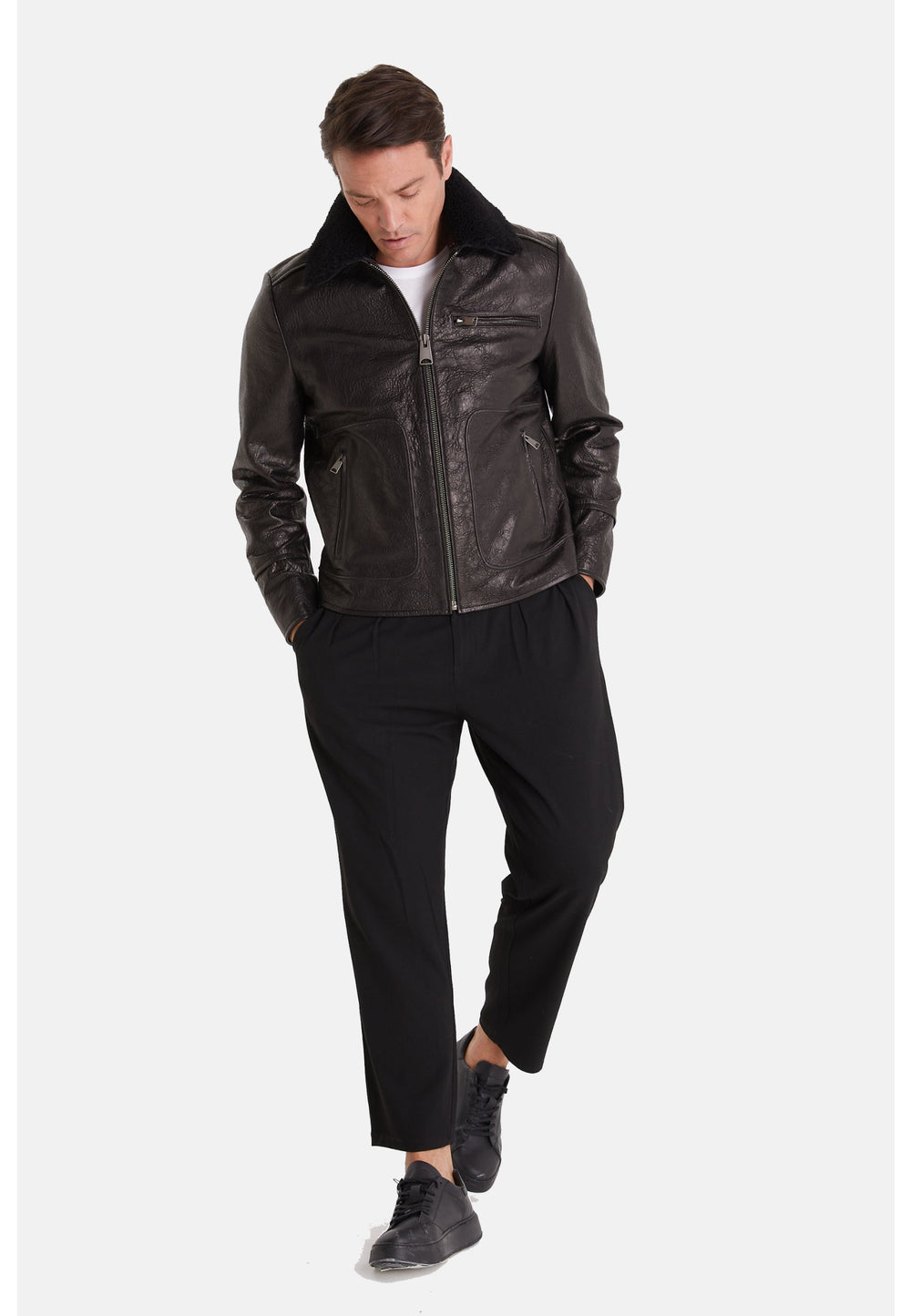 Man wearing dark leather jacket