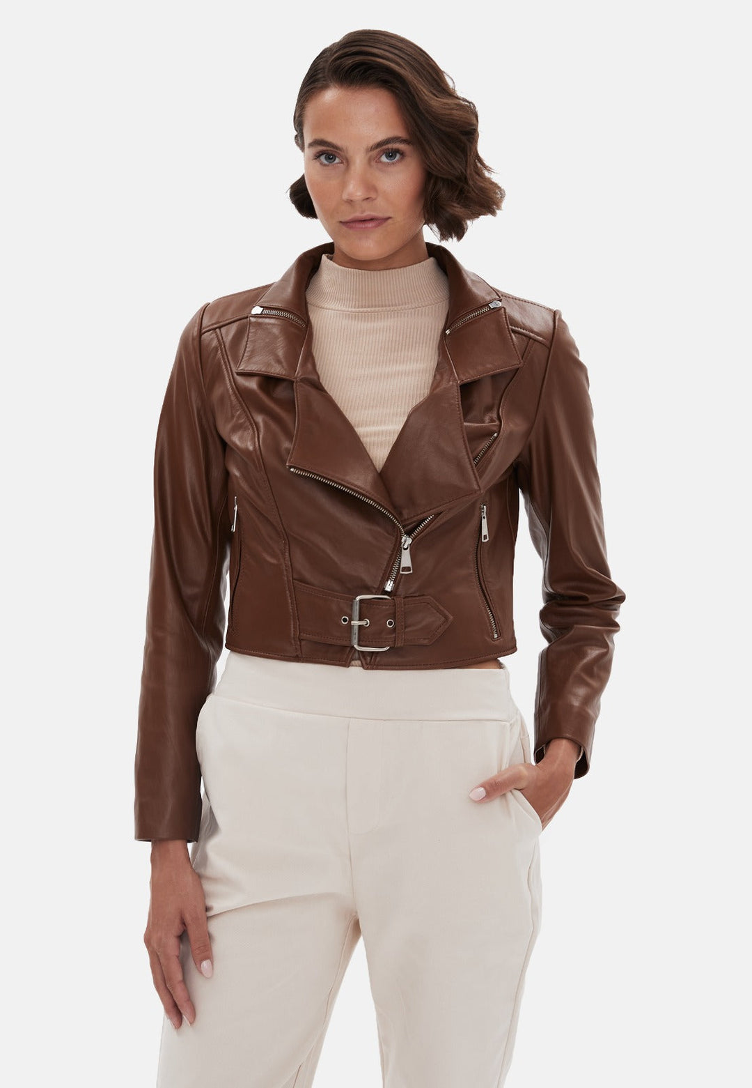 Woman wearing brown leather biker jacket