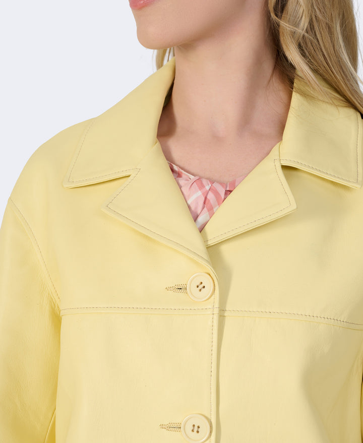 Pale yellow leather jacket close-up