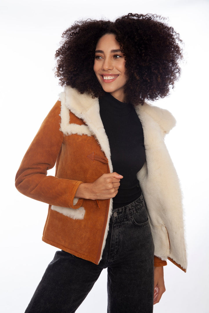 Tan shearling jacket with cream lining