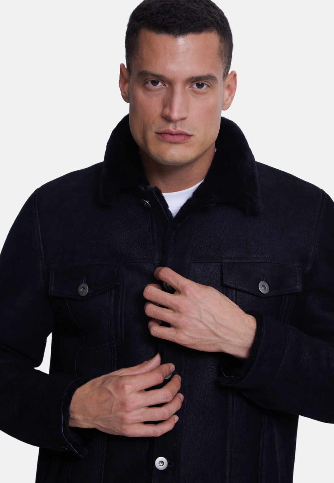Man wearing black suede jacket