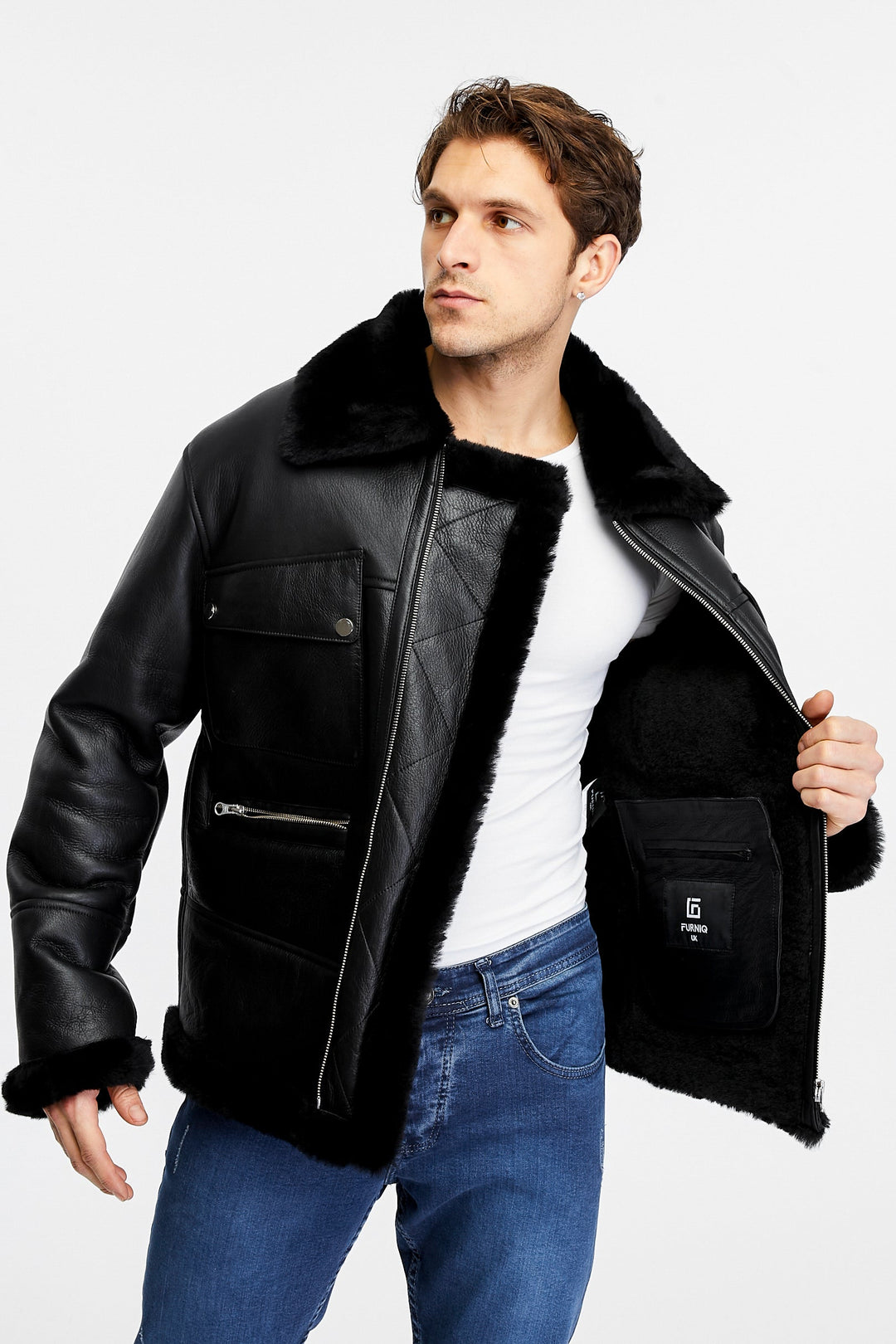 Man wearing black shearling leather jacket