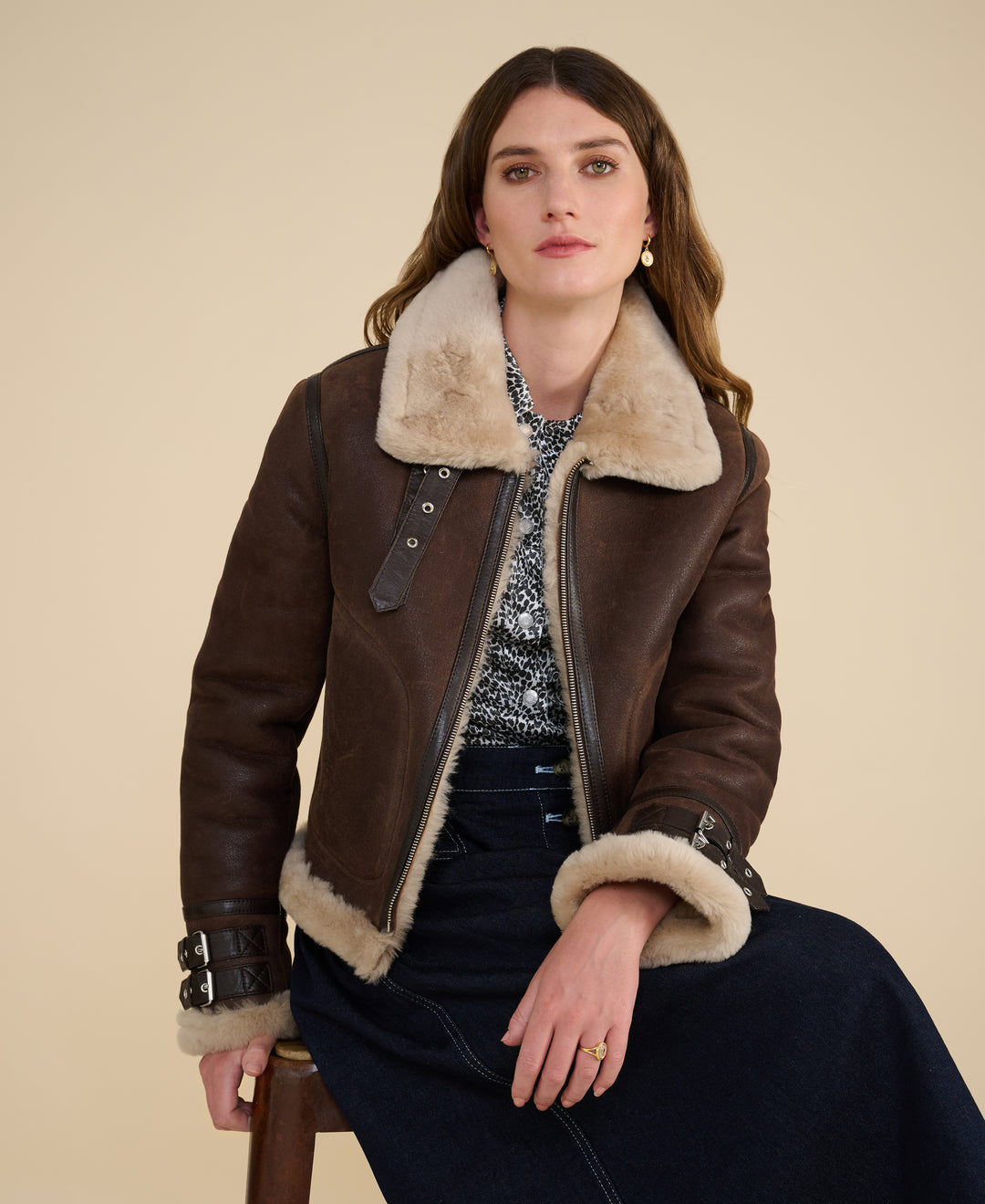 Briar women's cropped brown sheepskin aviator jacket styled open with natural cream shearling trim