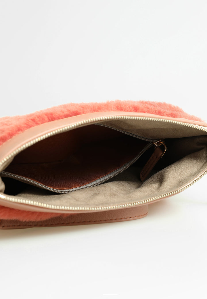 Open brick shearling clutch bag