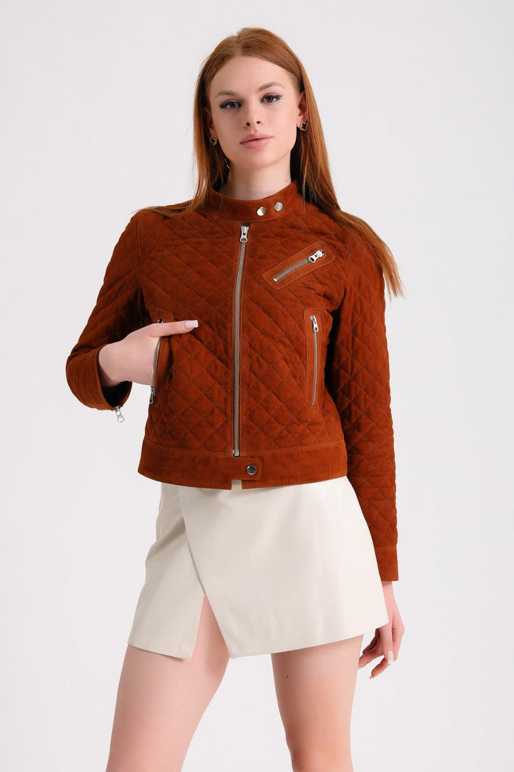 Woman wearing rust suede quilted jacket