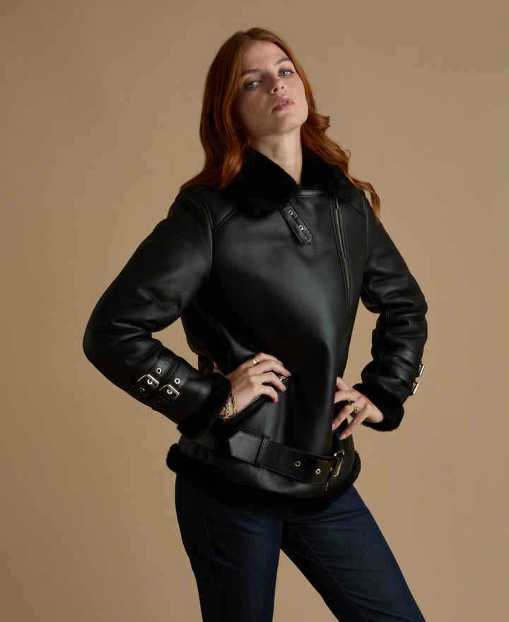 Black shearling leather jacket on model