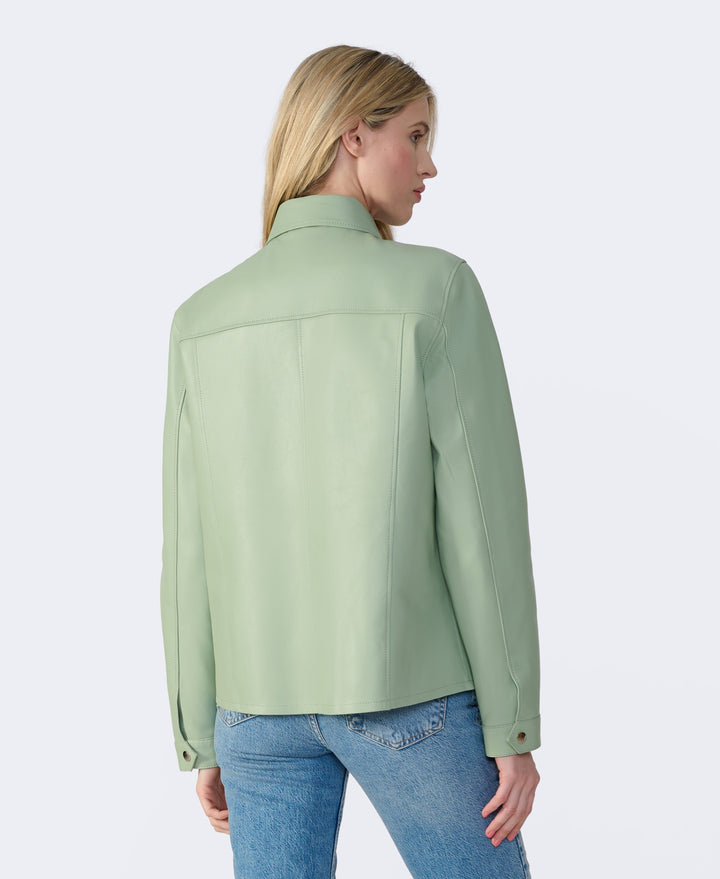 Sage leather shirt jacket on model