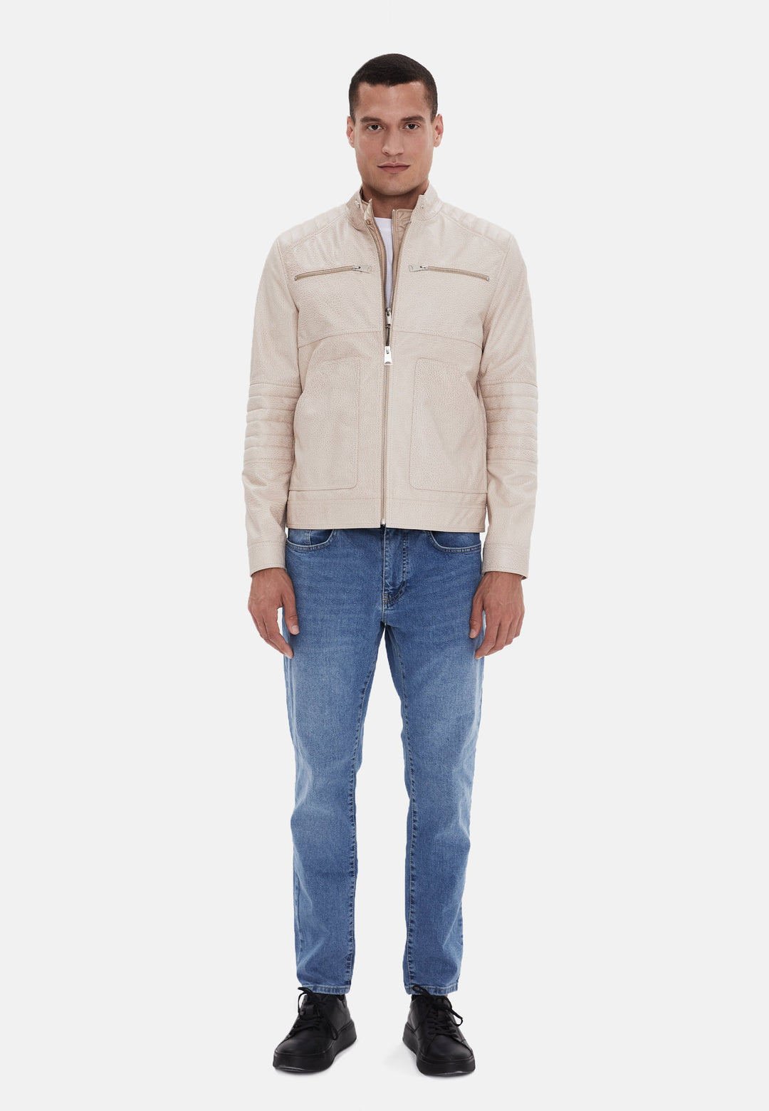 Man wearing beige leather jacket