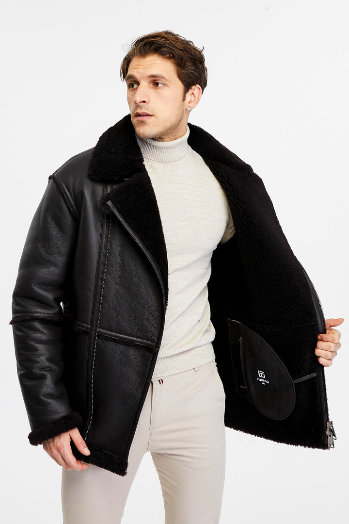 Man wearing black shearling coat