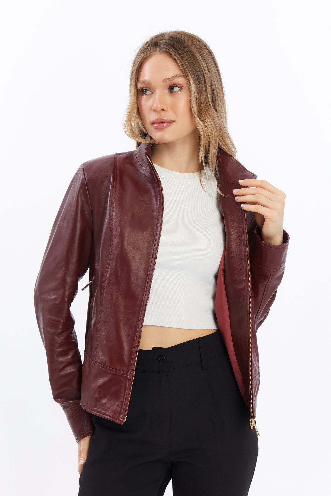 Woman wearing burgundy leather jacket